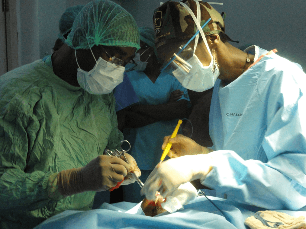 Prof. Prosper Igboeli and Dr. Ifeoma Igboeli FACS performing surgery